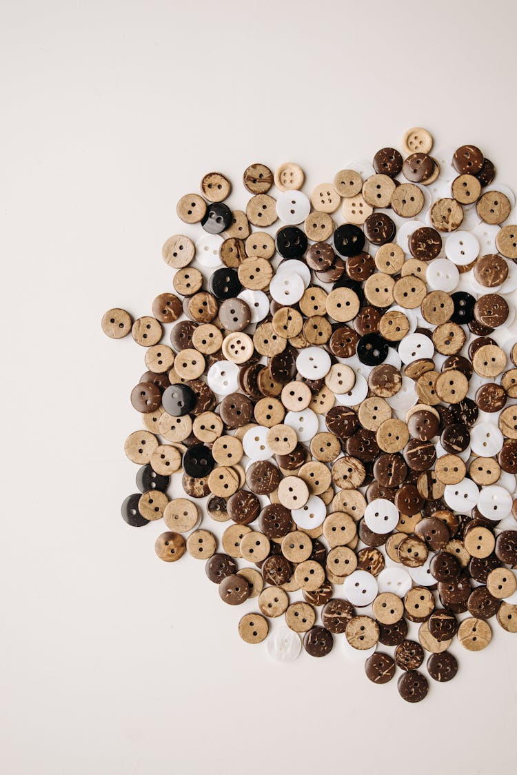 Wooden Buttons On White Surface