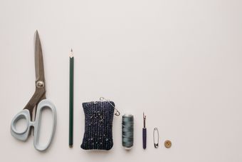 Sewing tools laid out in a row, photo by Pavel Danilyuk on Pexels