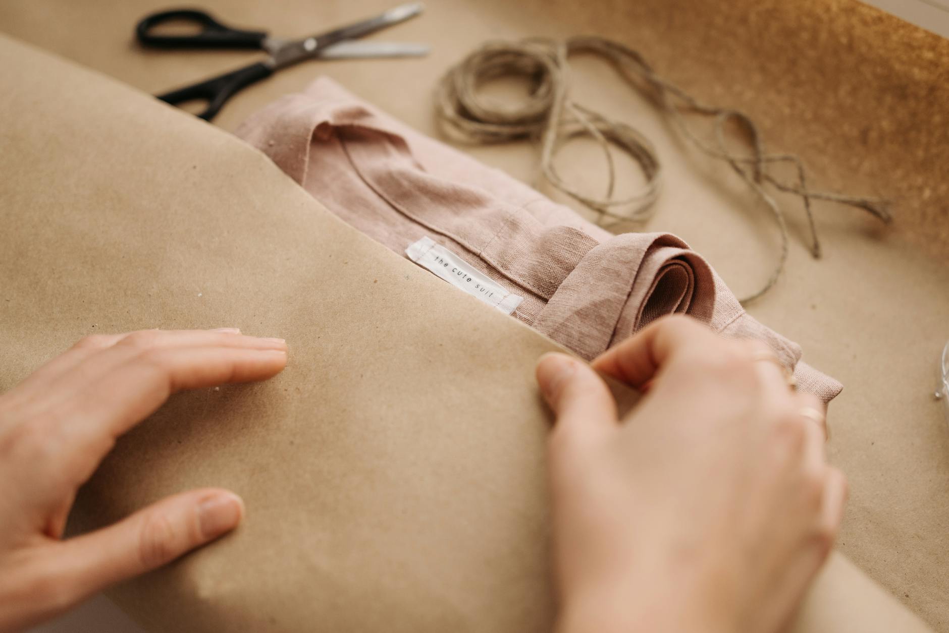 Sustainable Fashion https://www.pexels.com/photo/person-holding-brown-leather-shoe-6461517/