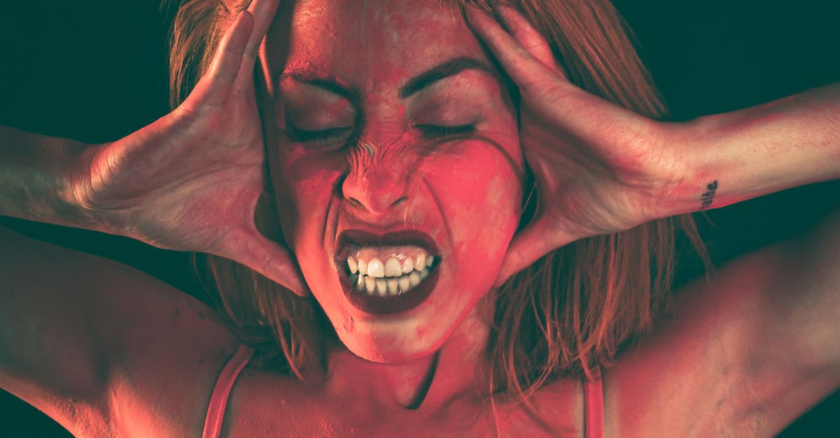Powder Scream A Woman Screaming with Red Powder on Her Face · Free Stock Photo