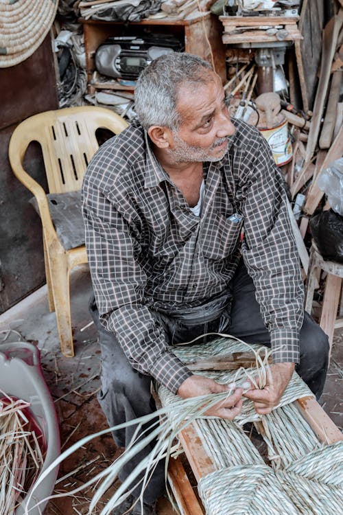 Man Working with Ropes