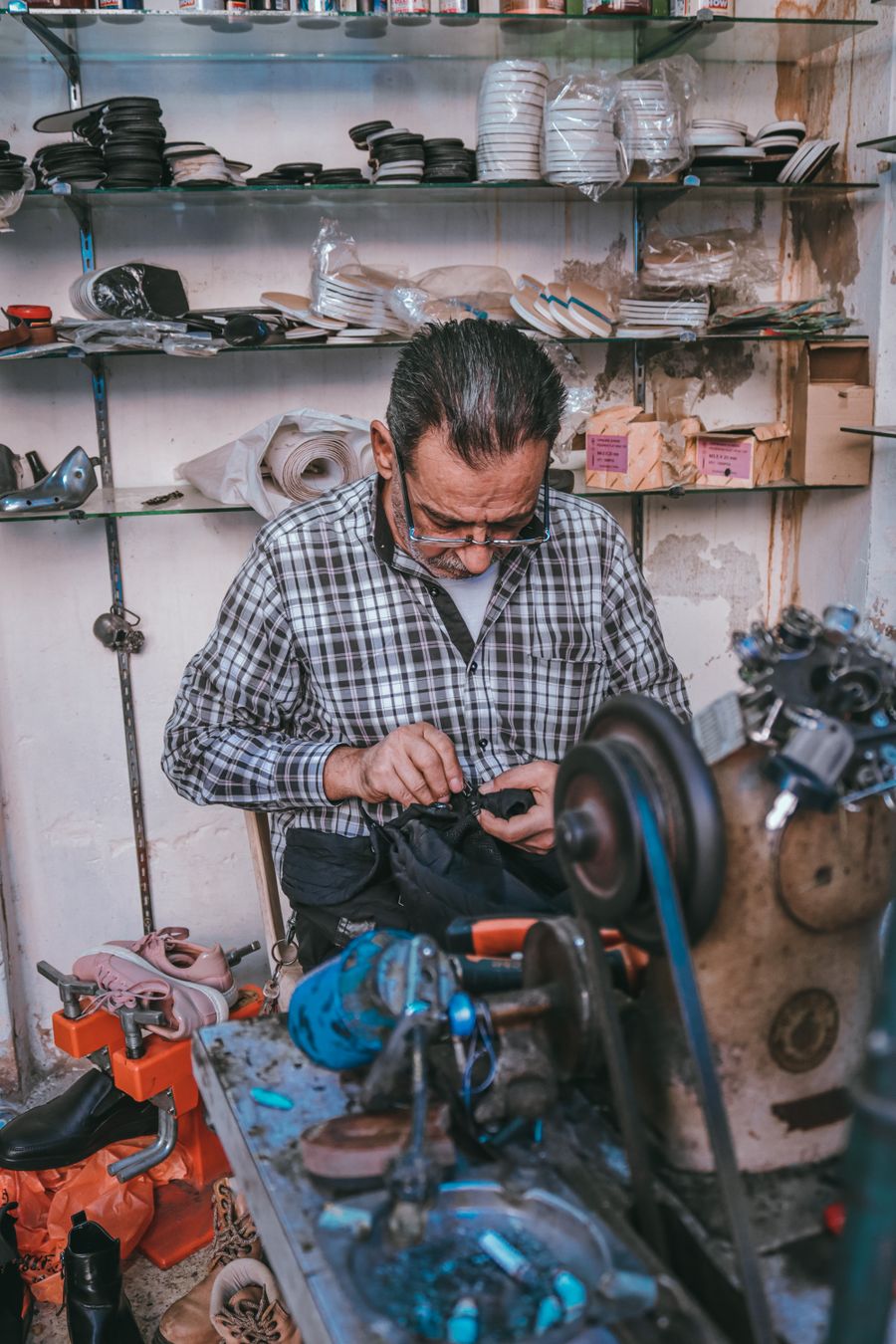 A machine operator finishing a component