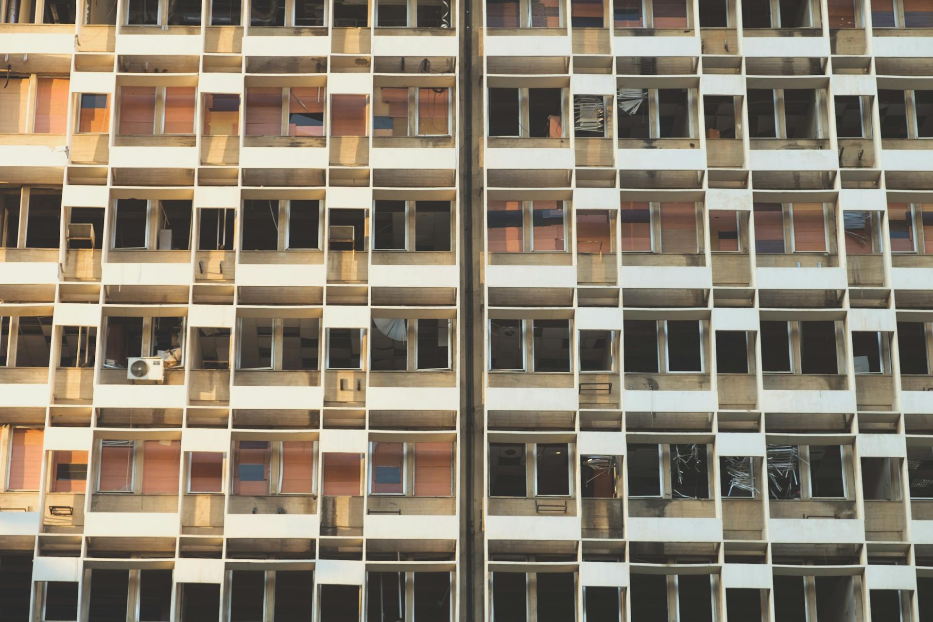 Close-up of a damaged building facade in Beirut, reflecting urban destruction.