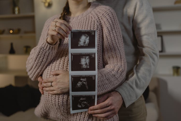 A Couple Holding Ultrasound Picture