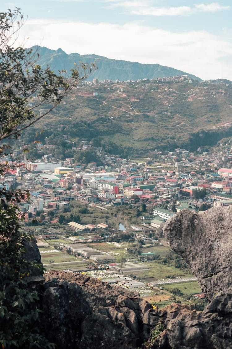 Aerial View Of City Near Mountains