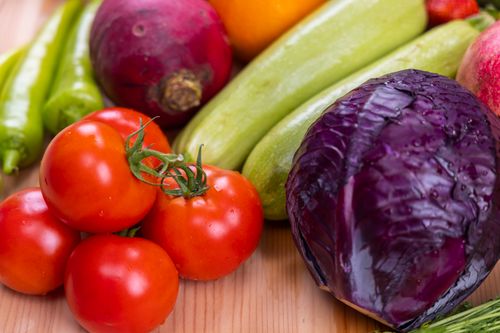 Free A vibrant assortment of fresh, organic vegetables on a wooden table, perfect for healthy eating. Stock Photo