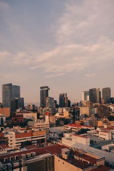 Vibrant cityscape of Mexico City with modern architecture and clear skies.