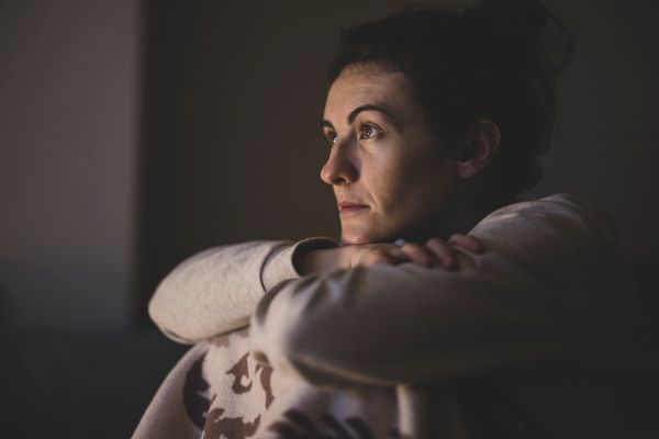 Engin Akyurt on Pexels — self-view tile of a second caller in a dim room