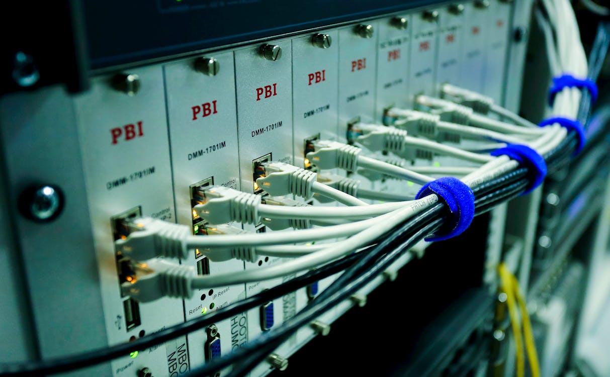 Free Close Up Photo of Ethernet Cables on Network Switch  Stock Photo