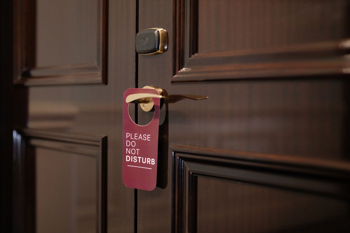 Do not disturb notice on a premium hotel room door