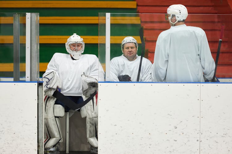 A Hockey Players Sitting At The Stadium