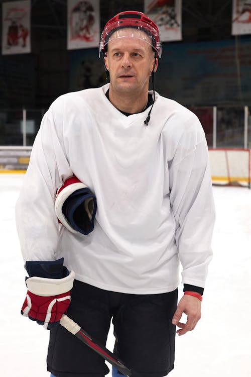 A Man in Ice Hockey Uniform