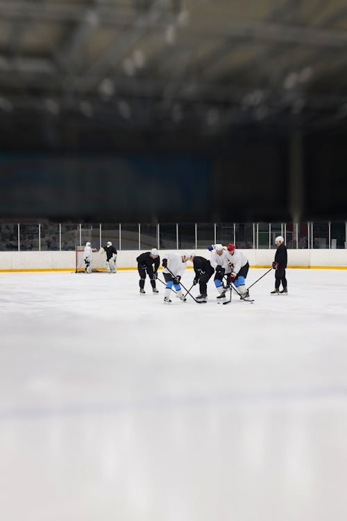 Men Playing Ice Hockey