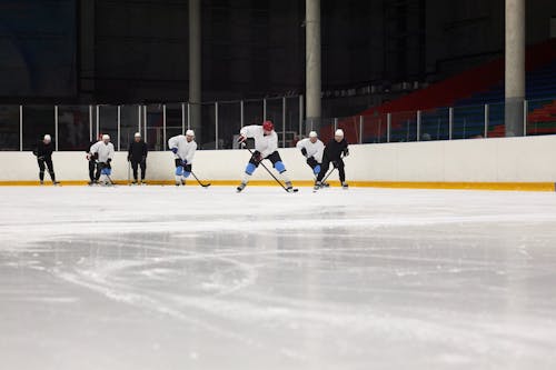 A Group of Men Playing Ice Hockey