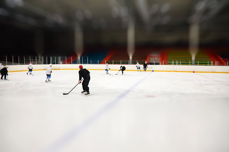 Men Playing Ice Hockey