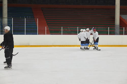 Free Men Playing Ice Hockey Stock Photo