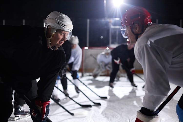 Men Playing Ice Hockey