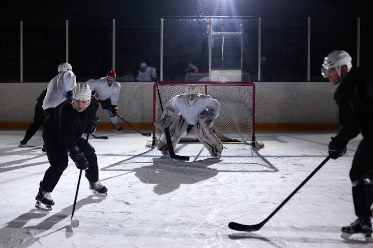 Men Playing Ice Hockey