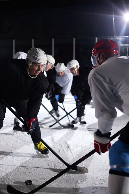 Men Playing Ice Hockey