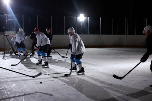 Men Playing Ice Hockey