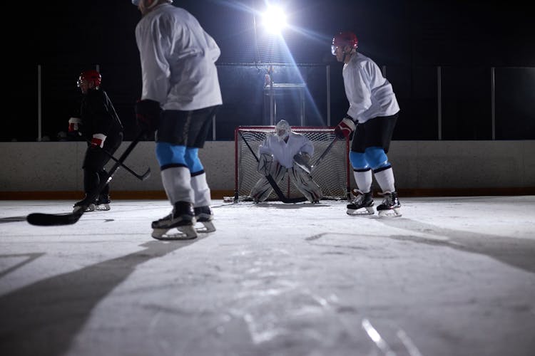 Men Playing Ice Hockey