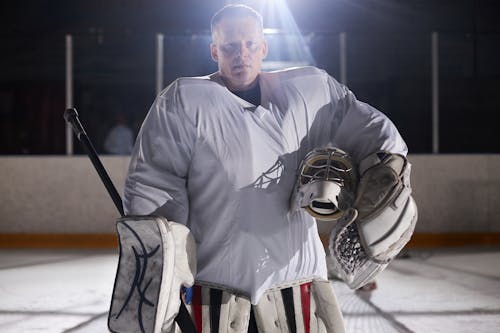 Man in Hockey Sportswear Looking at Camera