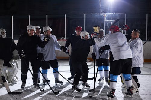 Men Playing Ice Hockey