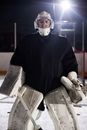 Man in White Padded Leg Gear