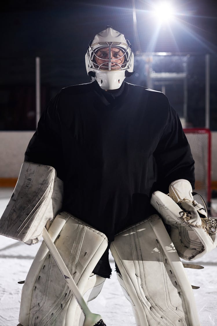 Man In White Padded Leg Gear