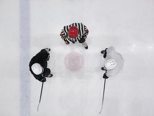 Free Top View of Men Playing Ice Hockey Stock Photo