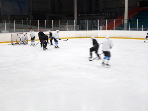 Men Playing Ice Hockey