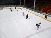 Ice hockey players on an indoor rink, photo by Tony Schnagl on Pexels