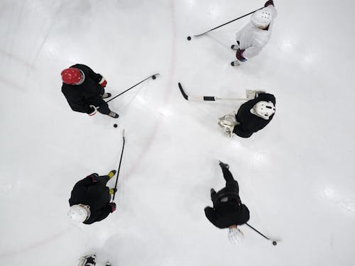 Free A Top View of Hockey Players Wearing Skullcap Stock Photo