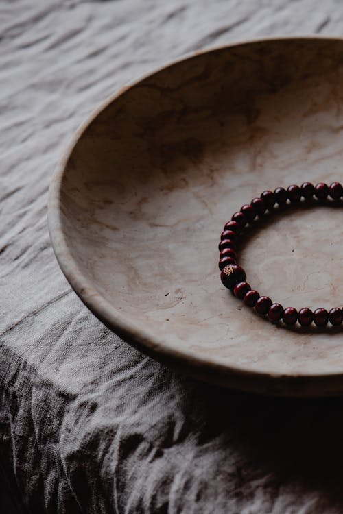 Prayer Beads on Ceramic Plate