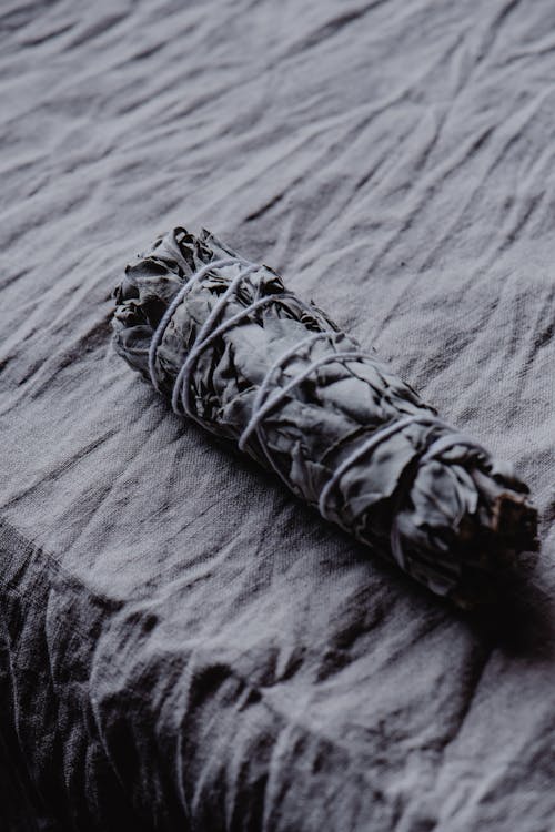 Free White Sage Smudge Stick on the Table Stock Photo