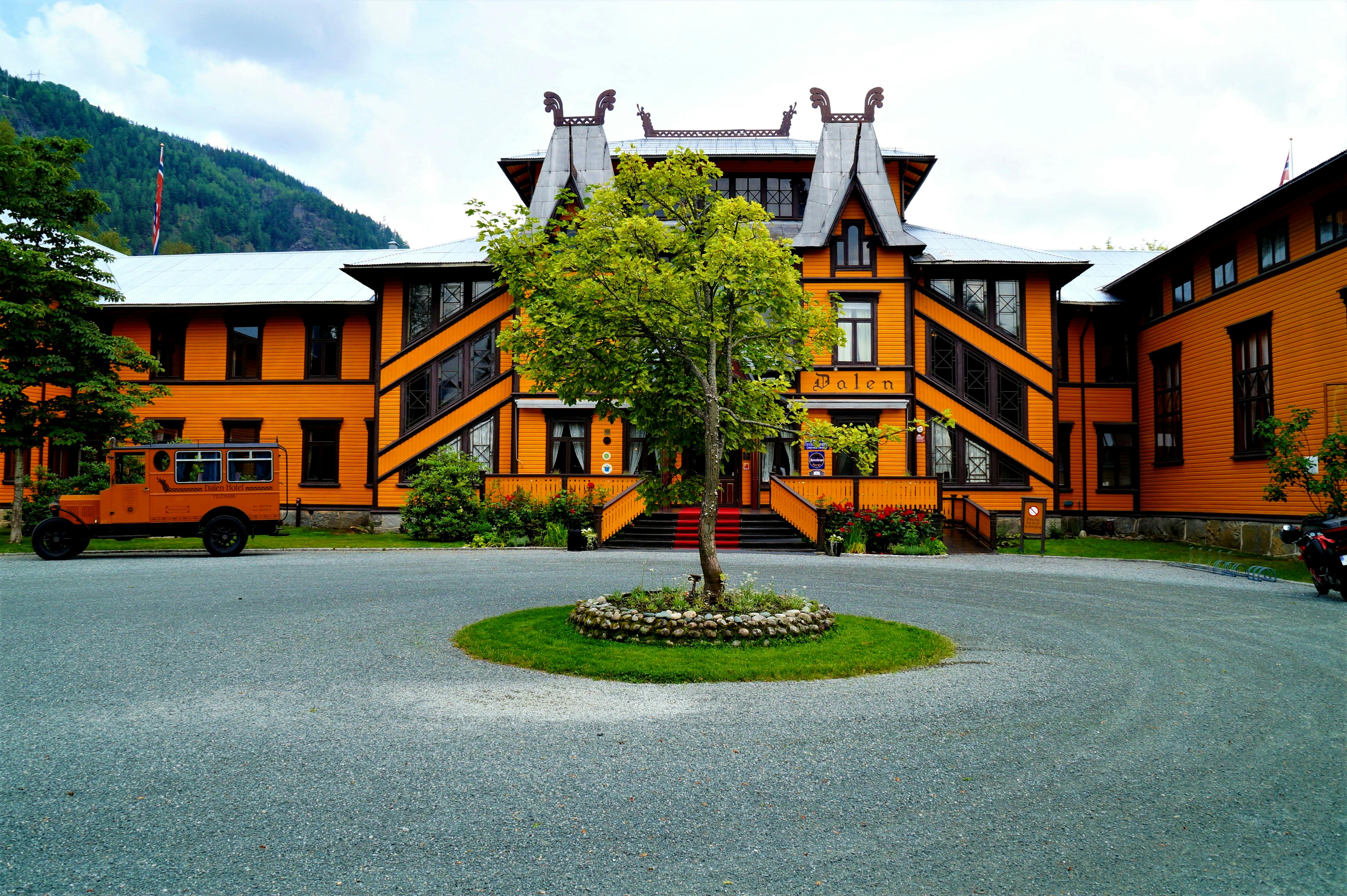 Front view of the iconic Dalen Hotel showcasing its striking architecture and vibrant colors.
