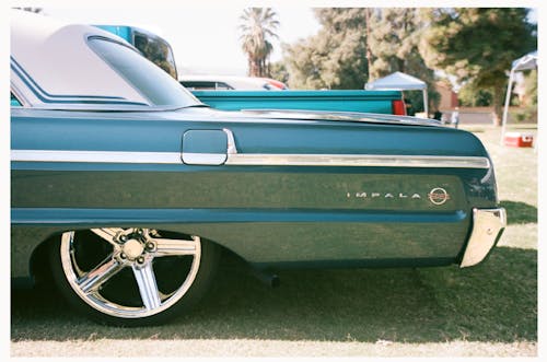 Blue Impala SS Chevrolet on Road