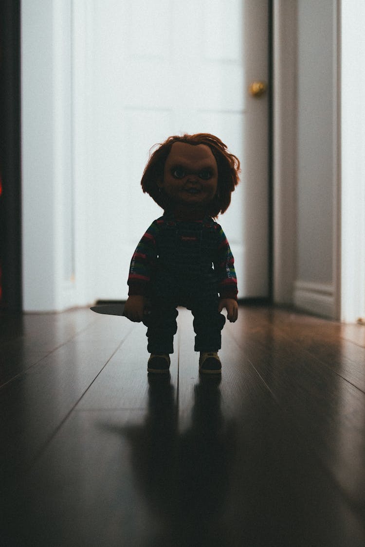 Photo Of A Famous Horror Movie Doll With A Knife