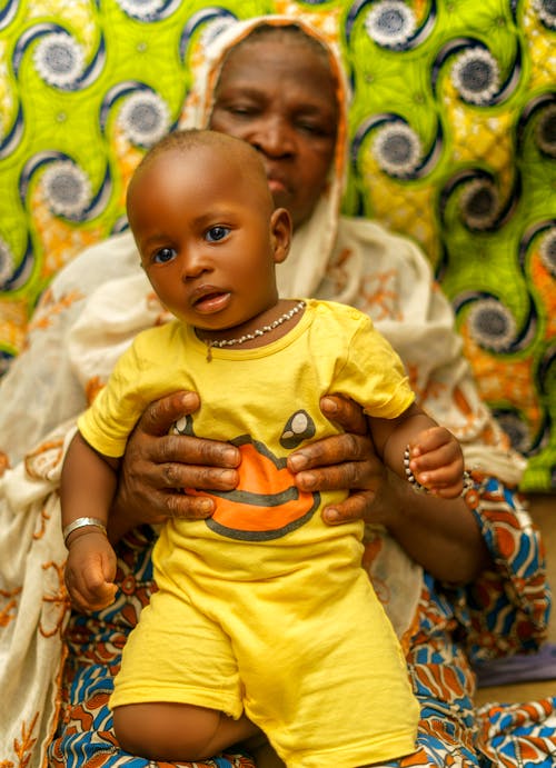 Kostenlos Kostenloses Stock Foto zu afrikanisches kind, baby, festhalten Stock-Foto