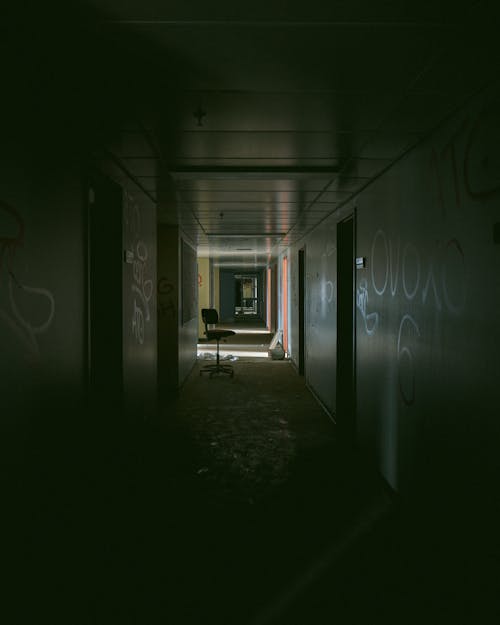 Free Empty Hallway Filled with Graffiti on Walls  Stock Photo