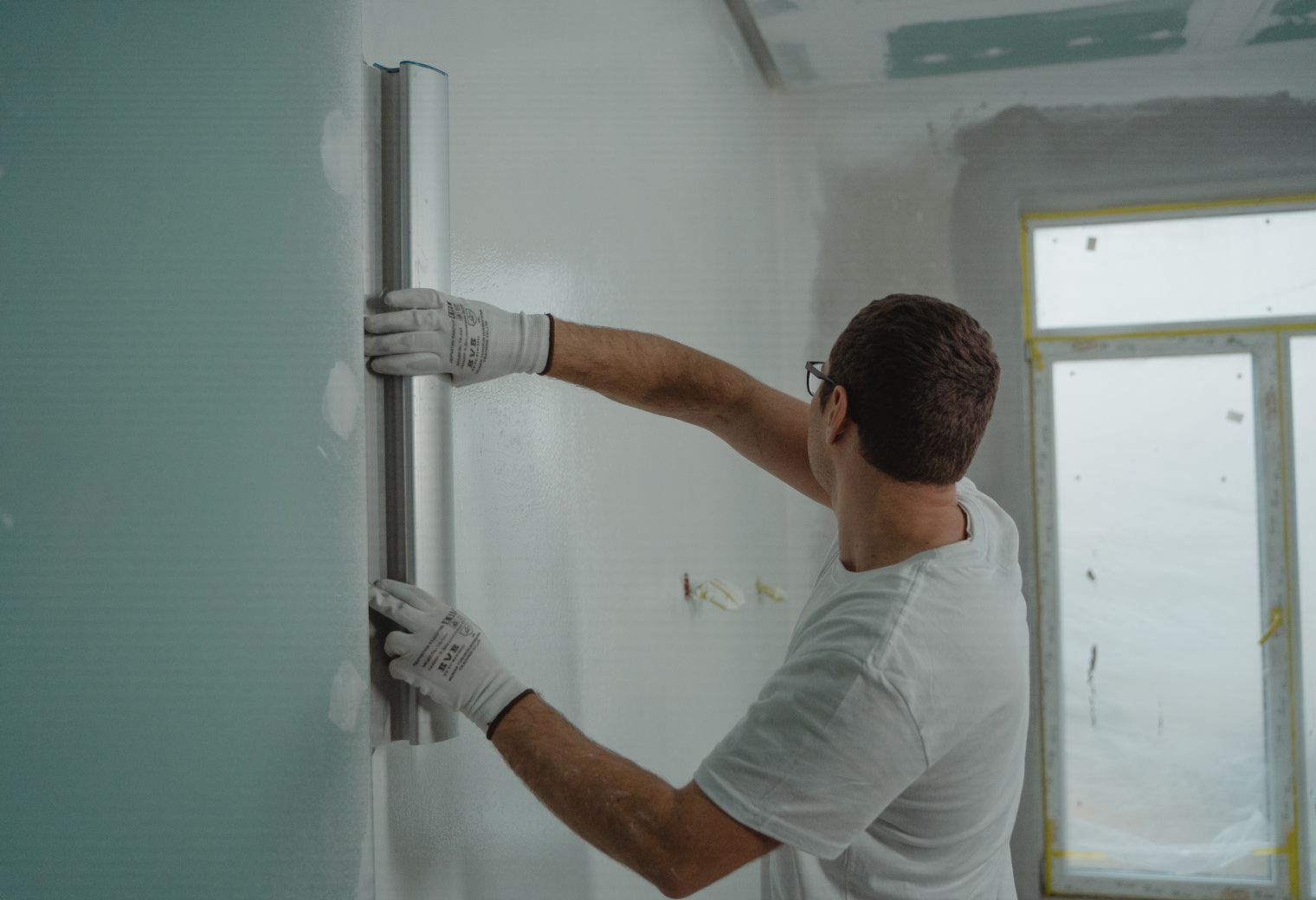 Painters and Decorators in Acton — clean edges cut in around trim and sockets
