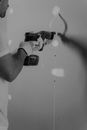 Grayscale Photo of Man Holding Black Dslr Camera