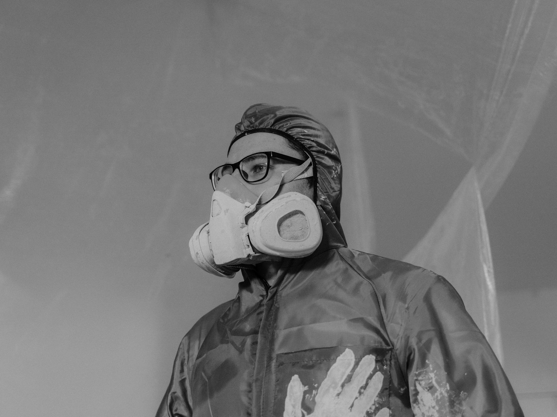 uPVC Spraying in Bow — a decorator at work mid-project