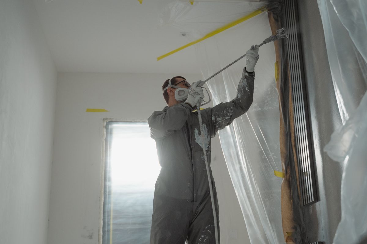 Spray application on prepped interior wall