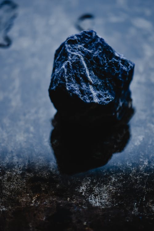 Black Stone on Black Surface