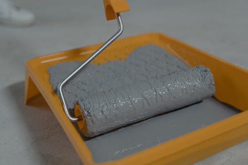 Gray Paint on Paint Roller Tray