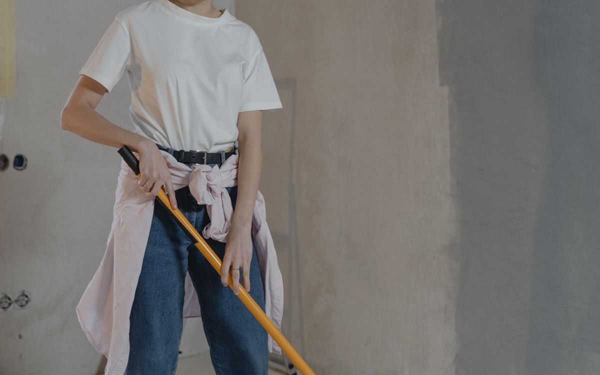 Technician treating a property for pests