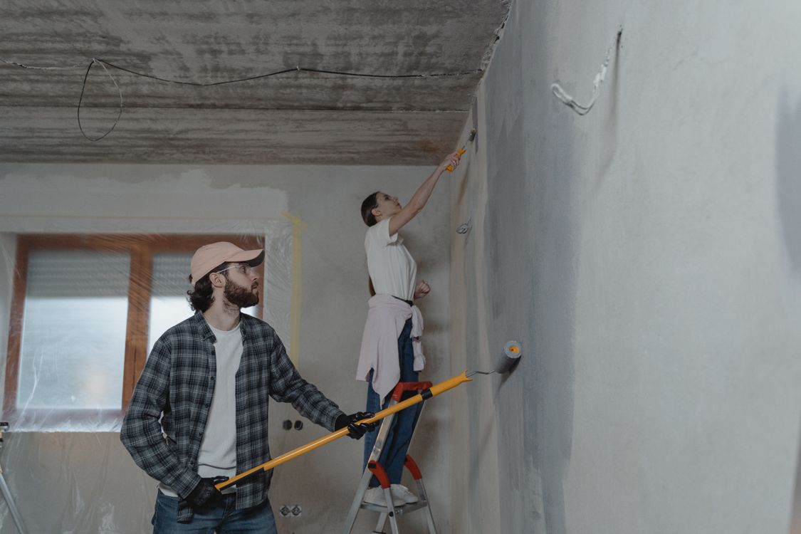 Couple working together during a home renovation project
