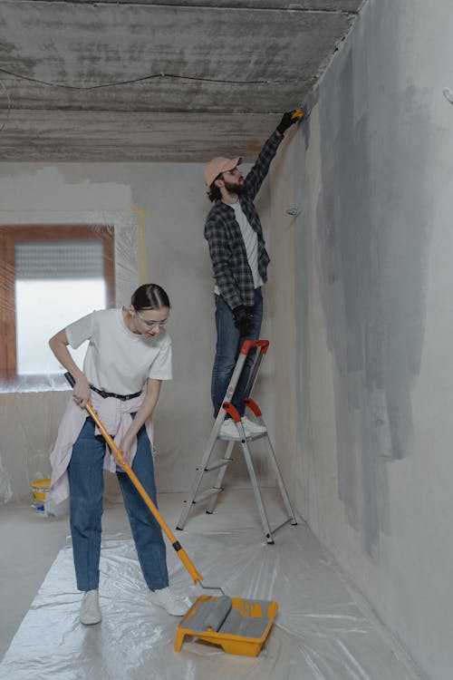 Couple Painting the Room