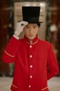 Man in Red Uniform and Top Hat